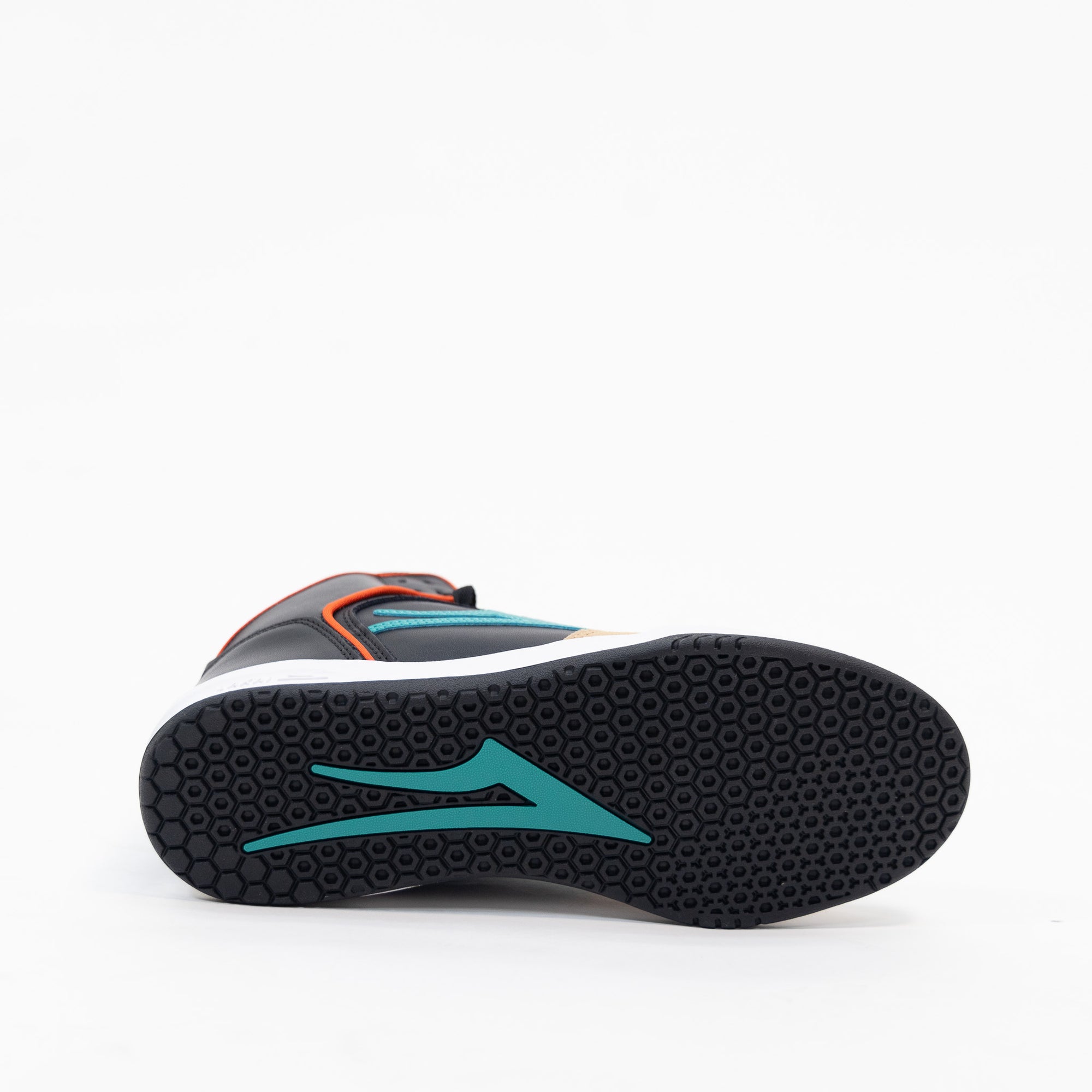 tan suede and black leather lakai men's skate shoe with blue logo and red detail