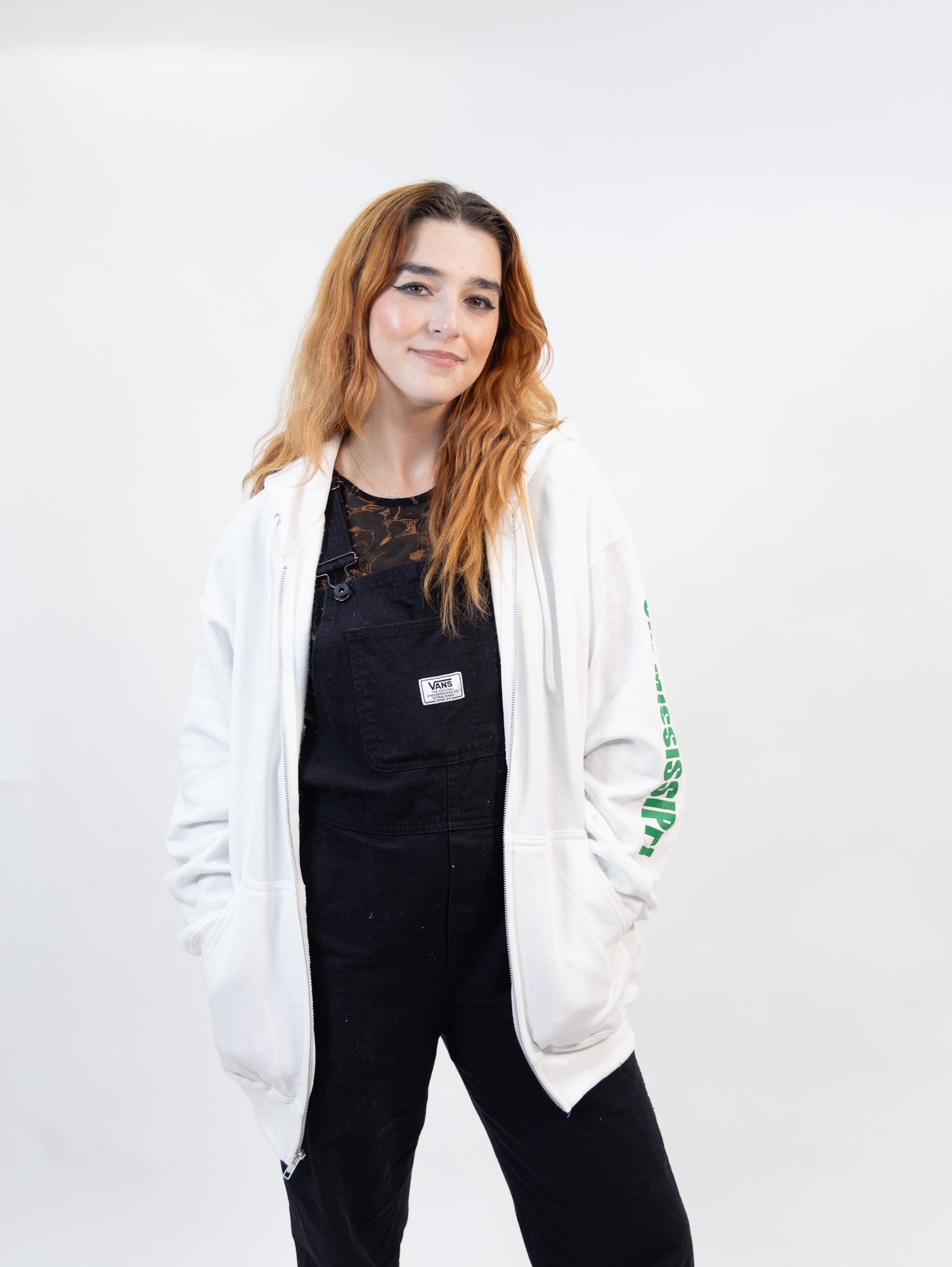 zip-up hooded sweatshirt featuring the ski mississippi logo in green brown and orange