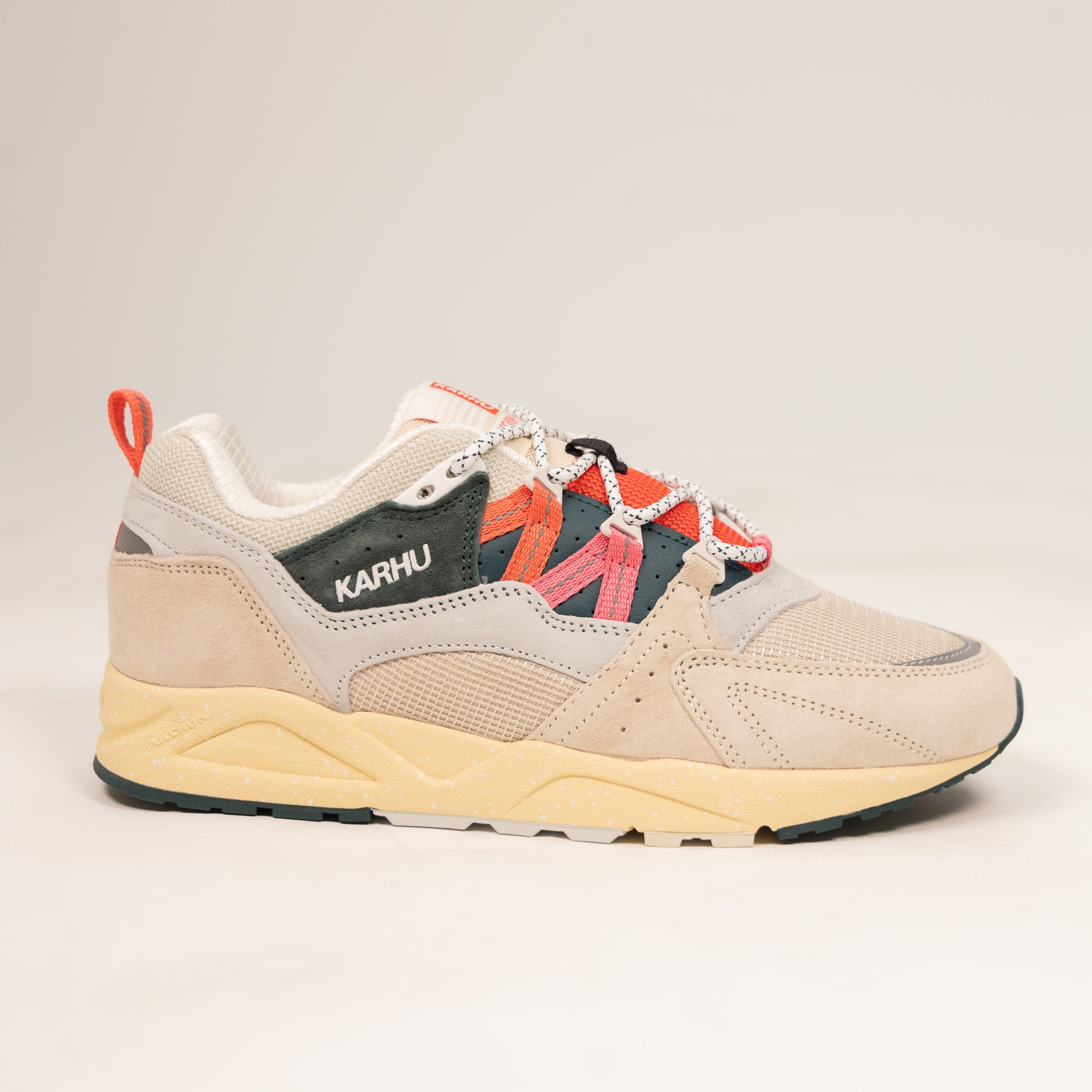 tan karhu women's comfort shoe with green pink and orange details