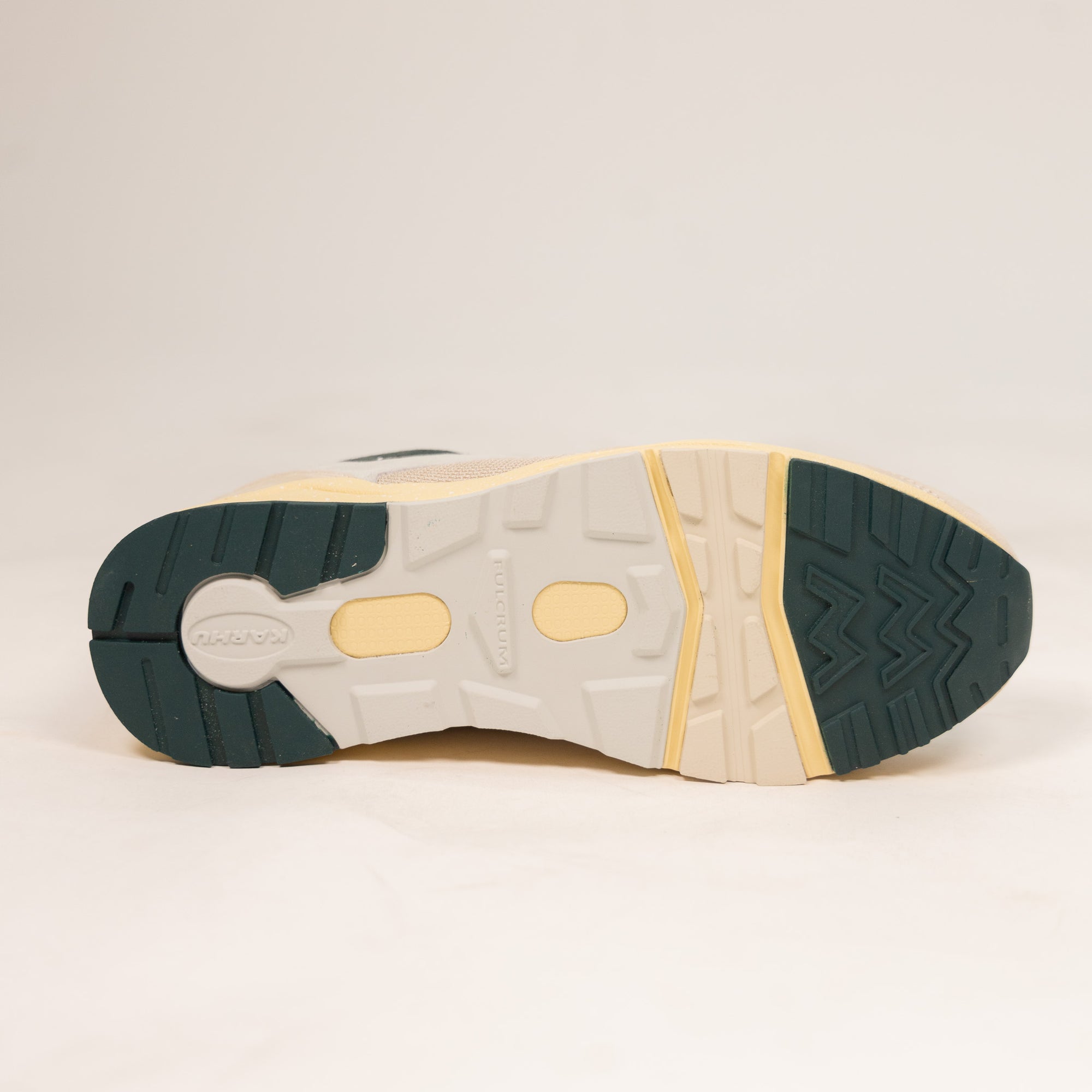 tan karhu women's comfort shoe with green pink and orange details