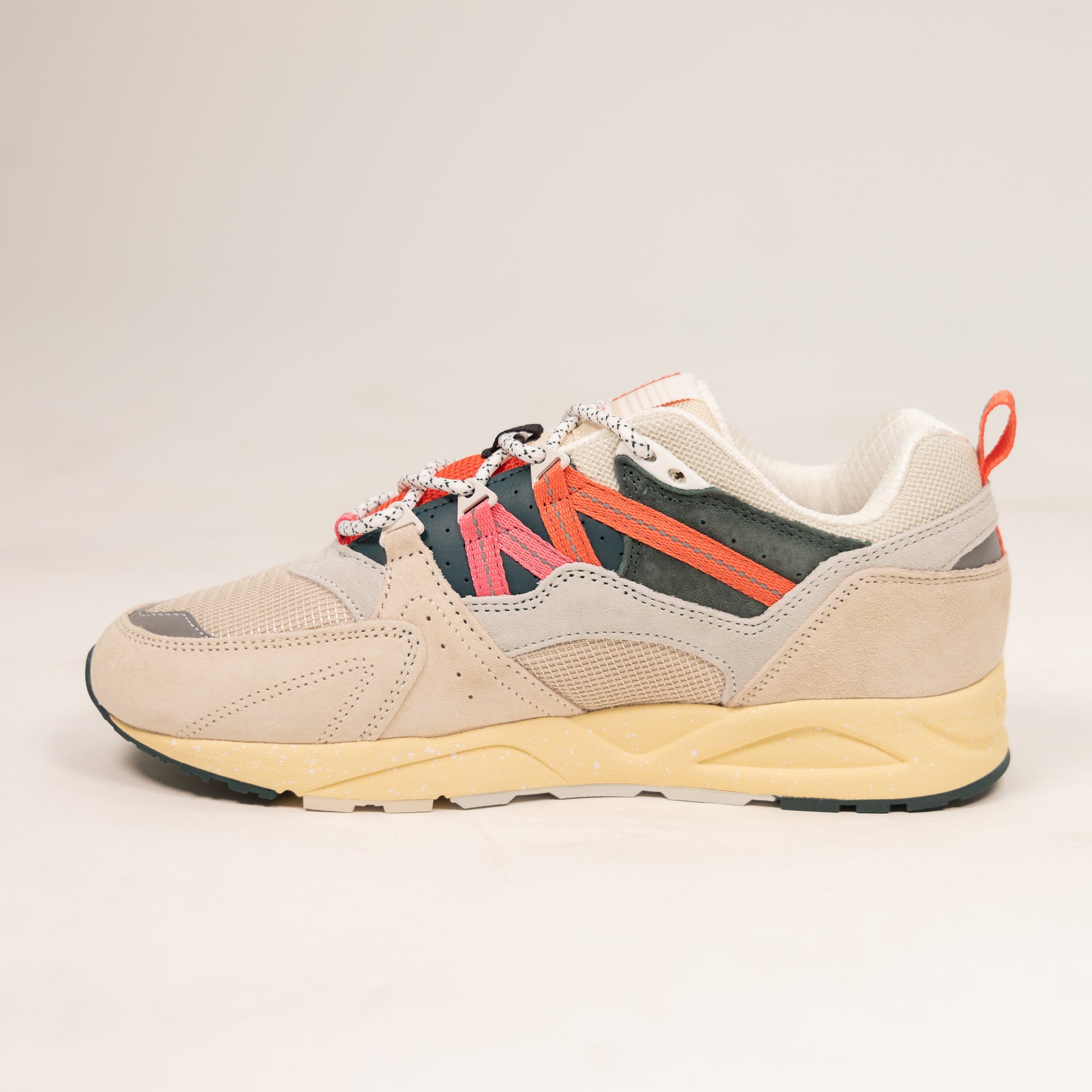 tan karhu women's comfort shoe with green pink and orange details