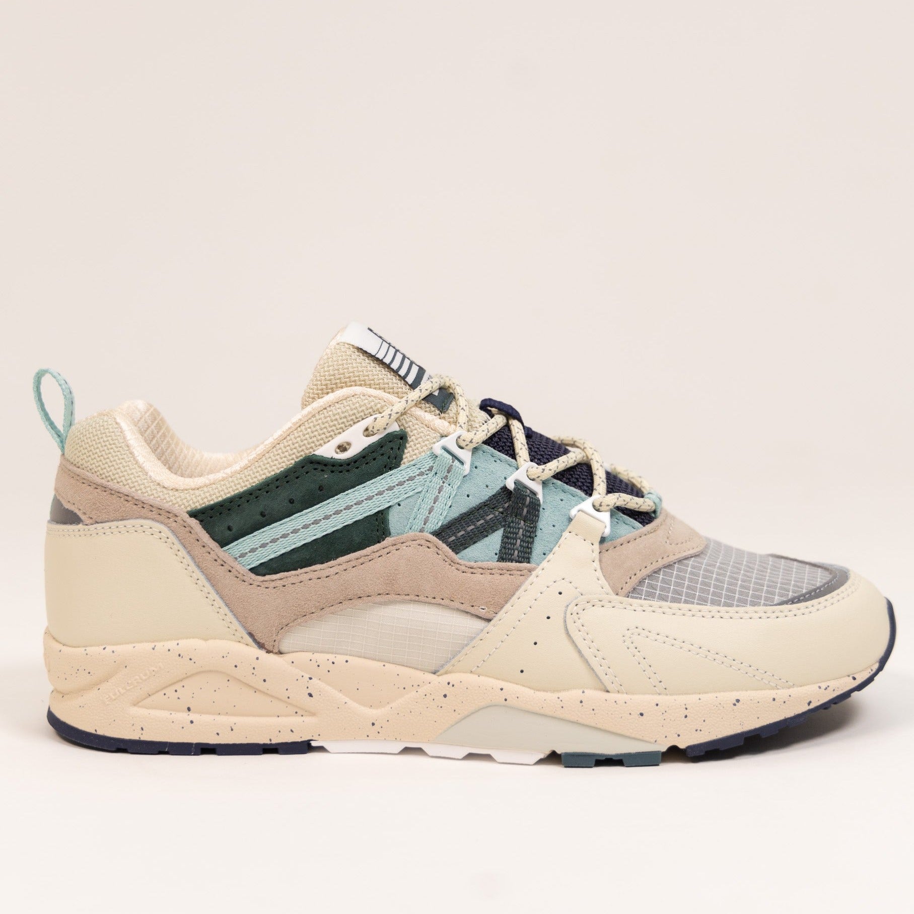 off white karhu women's shoe with clear toe and blue details