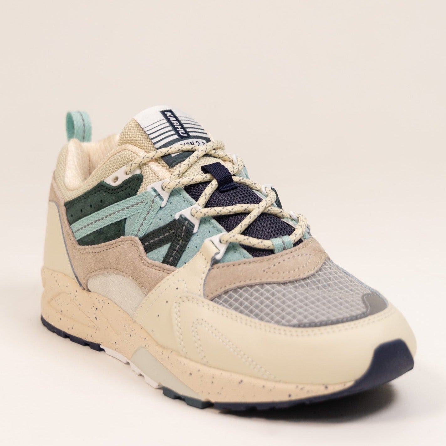 off white karhu women's shoe with clear toe and blue details
