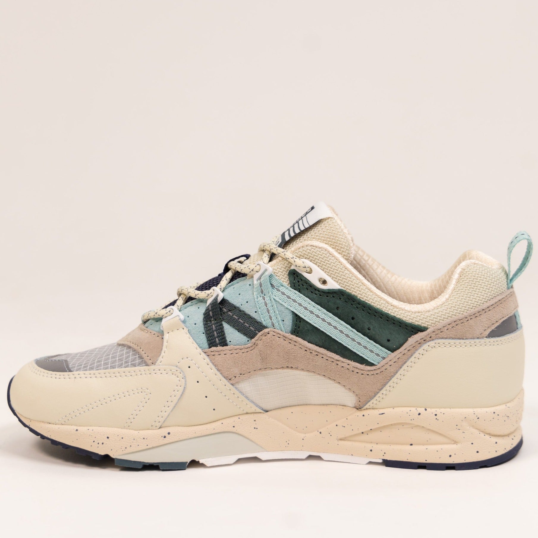 off white karhu women's shoe with clear toe and blue details