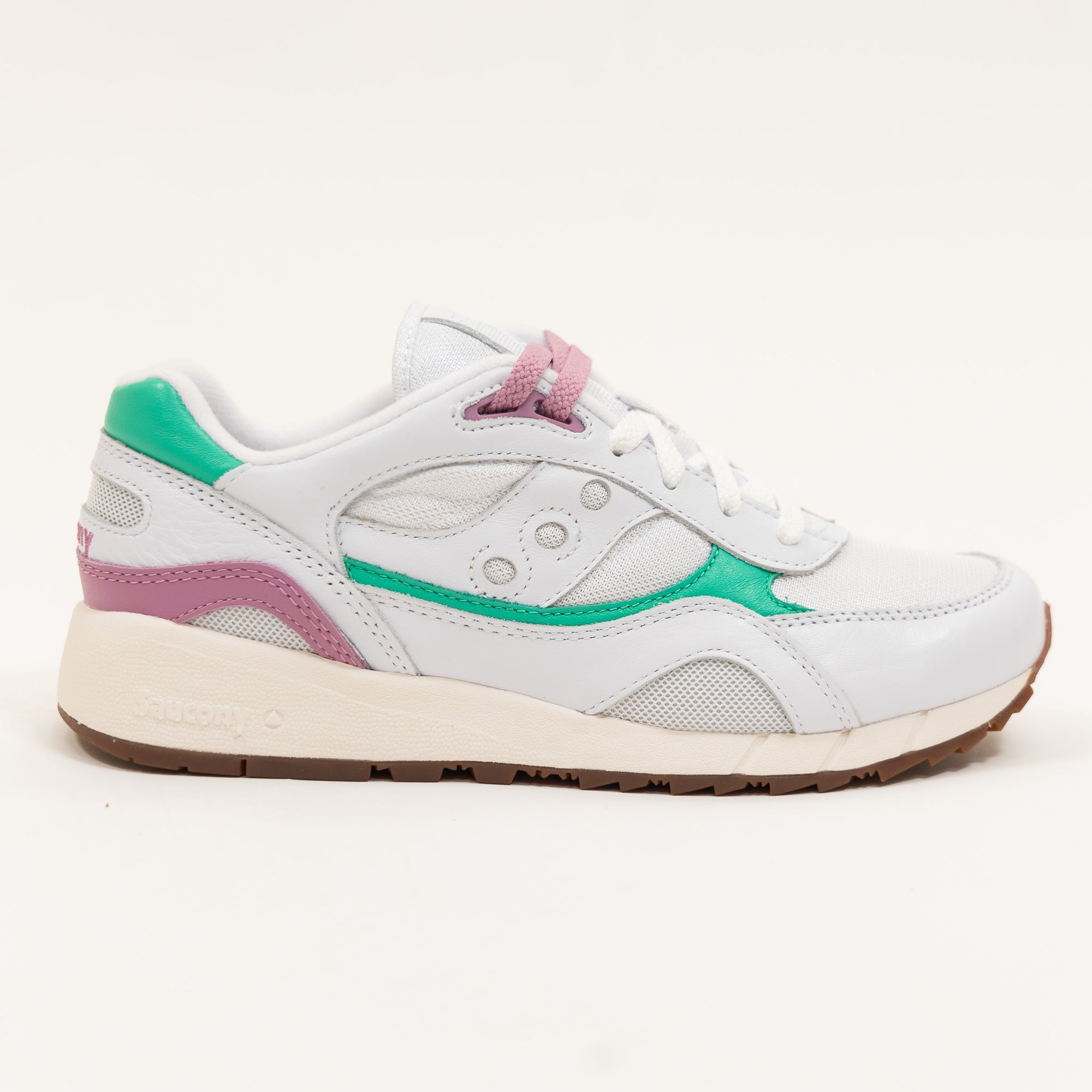 white leather saucony shadow 6000 women's comfort shoe with an off white sole and green and purple detail