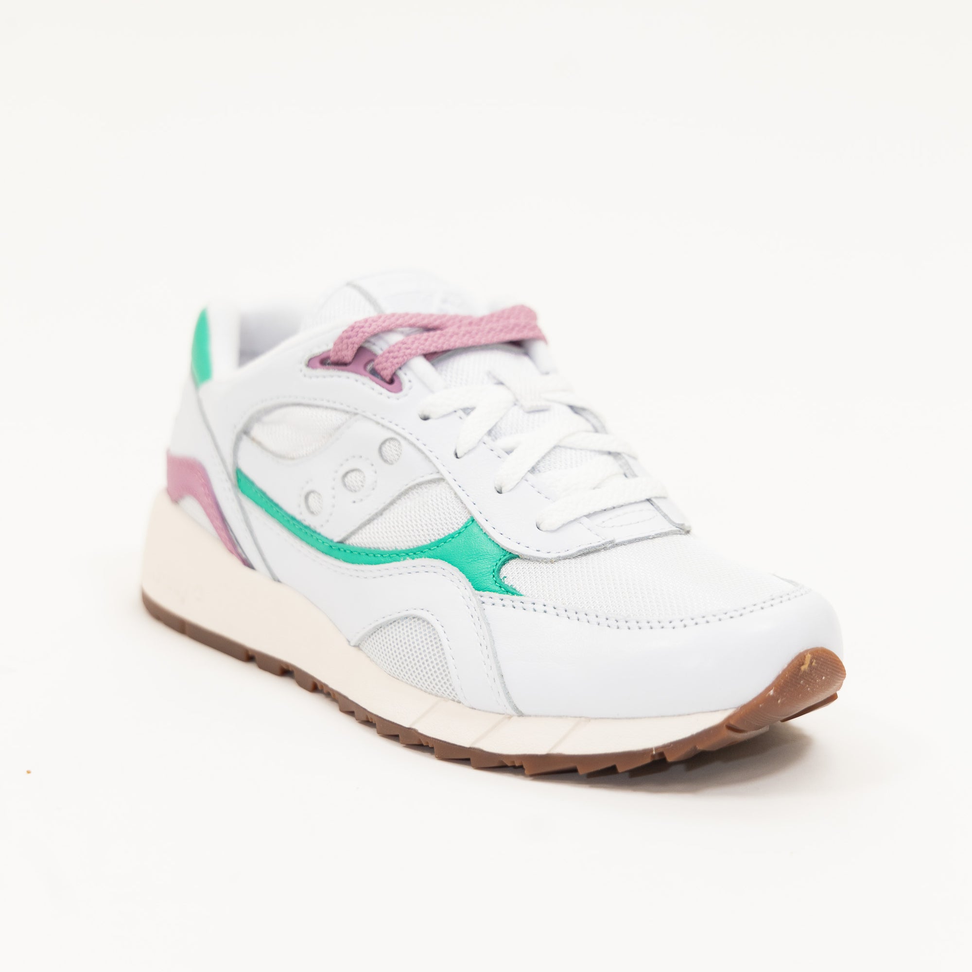 white leather saucony shadow 6000 women's comfort shoe with an off white sole and green and purple detail