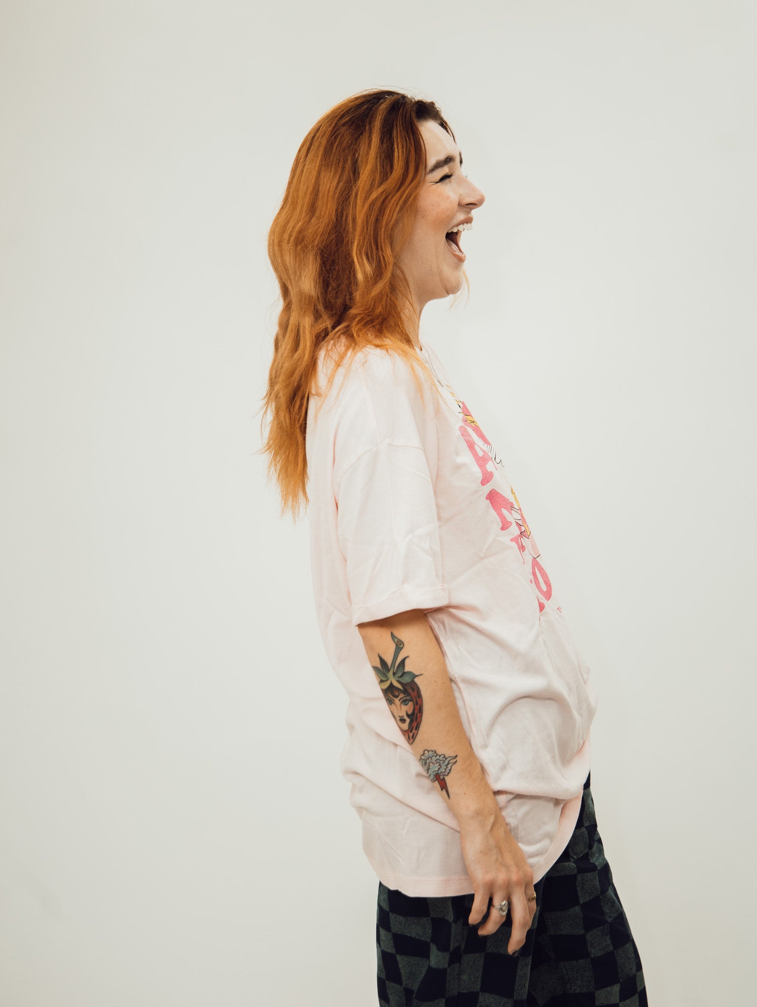 pink oversized women's tee shirt from the laundry room featuring the slogan ain't my first rodeo