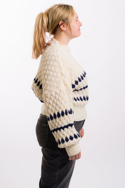 cream colored miou muse women's sweater with navy blue details