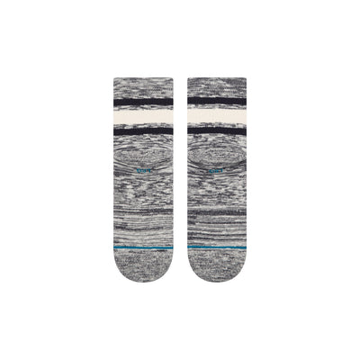 Pair of gray marbled stance socks with white and blue accents on a white background