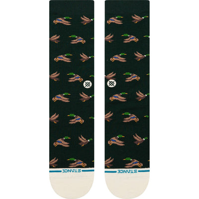 Dark green stance huntin socks with duck pattern on a white background
