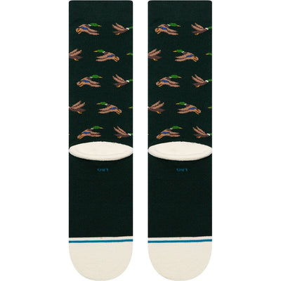 Dark green stance huntin socks with duck pattern on a white background
