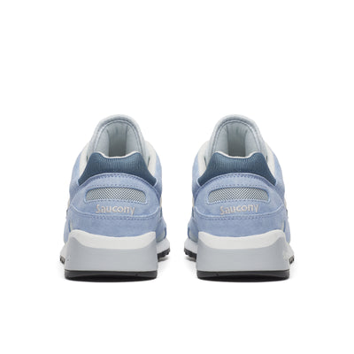 pair of Blue saucony shadow 6000 plein air sneaker from the back with white accents on a white background