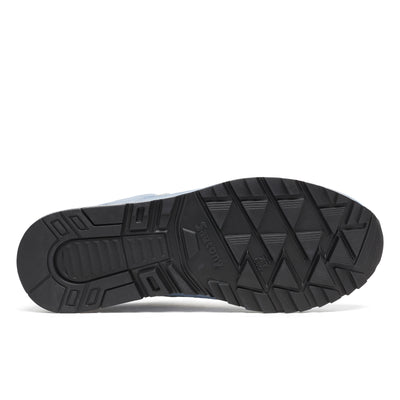 black sole of a Blue saucony shadow 6000 plein air sneaker with white accents on a white background
