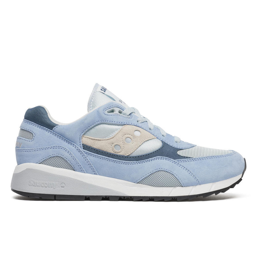 Blue saucony shadow 6000 plein air sneaker with white accents on a white background
