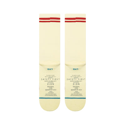 Pair of stance crew socks with red and blue zion national park design on a white background
