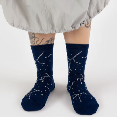 blue baggu crew sock featuring white stitched constellation