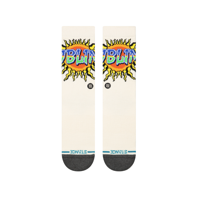stance x sublime collaboration crew sock featuring an off white sock with multi-colored sublime font over an orange and yellow sun