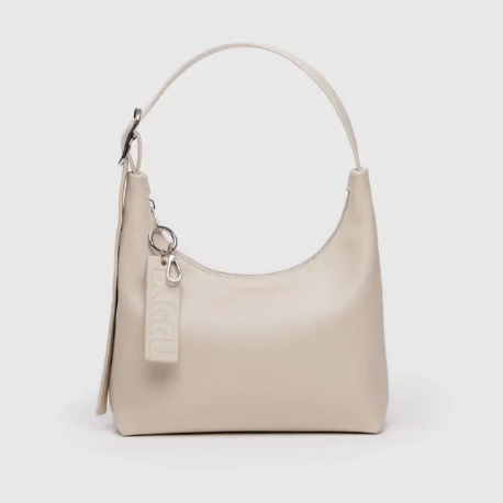 Beige baggu recycled leather handbag with a strap on a white background