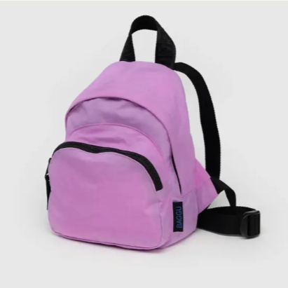Pink baggu backpack with black straps on a light gray background