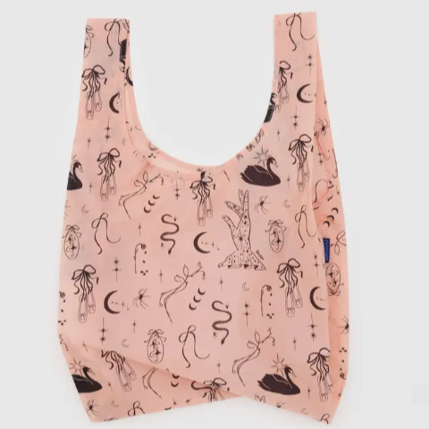 Reusable standard baggu shopping bag with black patterns on a pink background