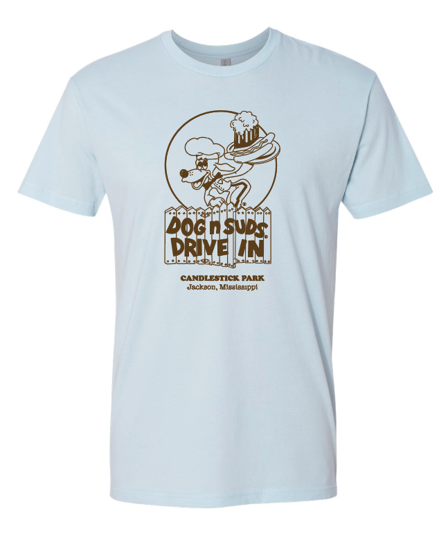 Beige dog n suds drive in candlestick park jackson ms t-shirt with a graphic design of a cartoon dog holding a beet and hotdog on a tray character and text on a white background