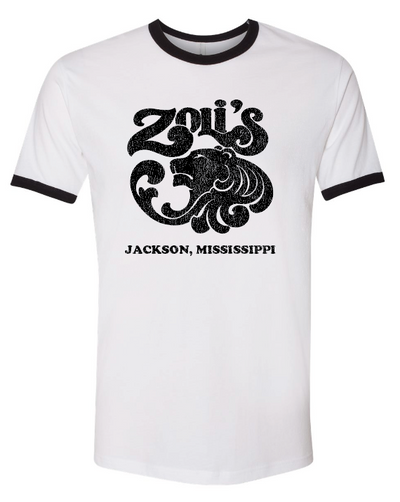 A white ringer t-shirt with black trim on the crew neck and sleeve cuffs, featuring a distressed black graphic of a lion and the text 'Zoli's Jackson, Mississippi' on the front.
