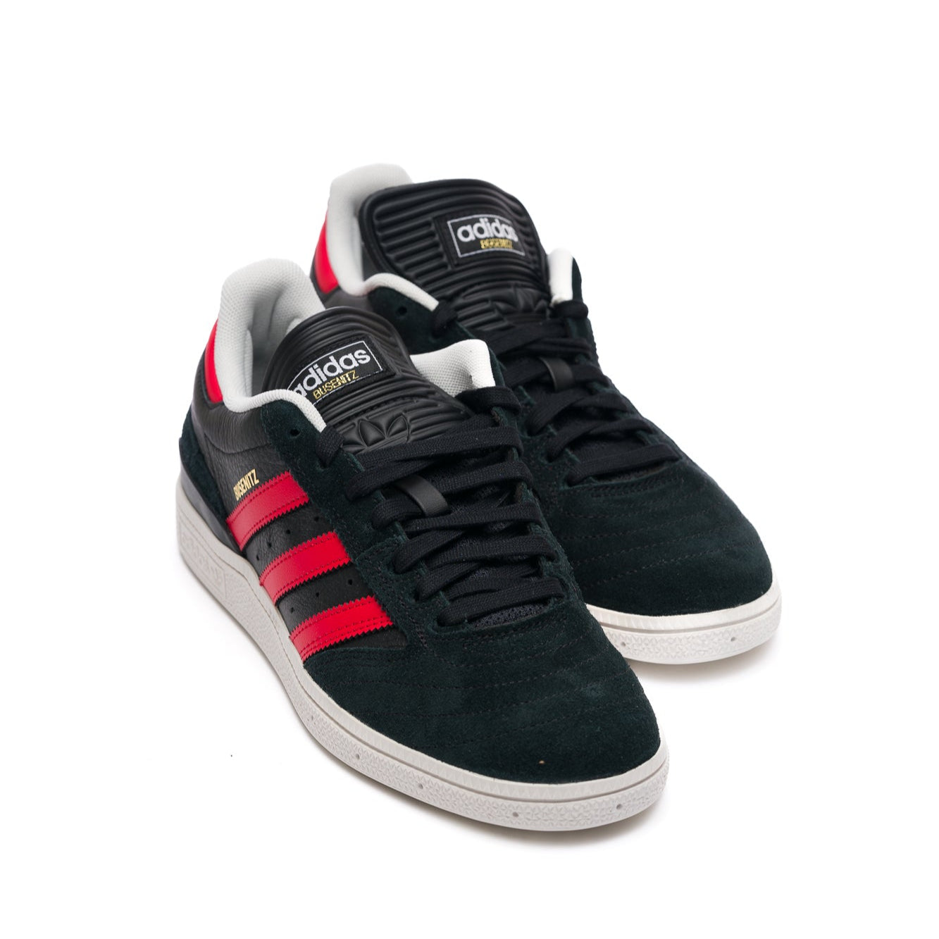 Black and red adidas skateboarding sneaker with three stripes on a white background