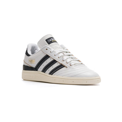 white leather adidas men's busentiz skateboard shoes with black stripes and off white sole