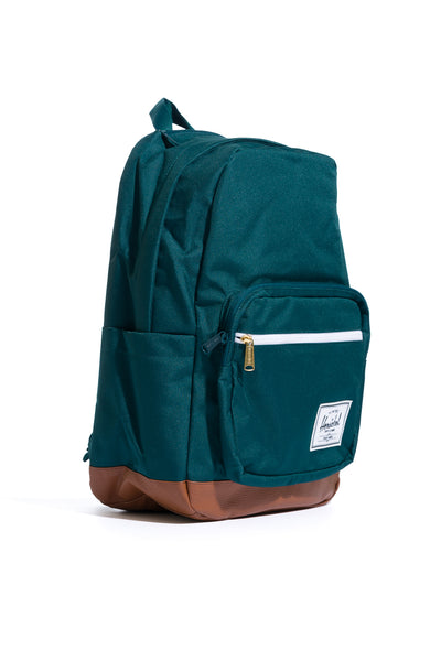 teal green herschel pop quiz backpack with white front pocket zipper and tan bottom