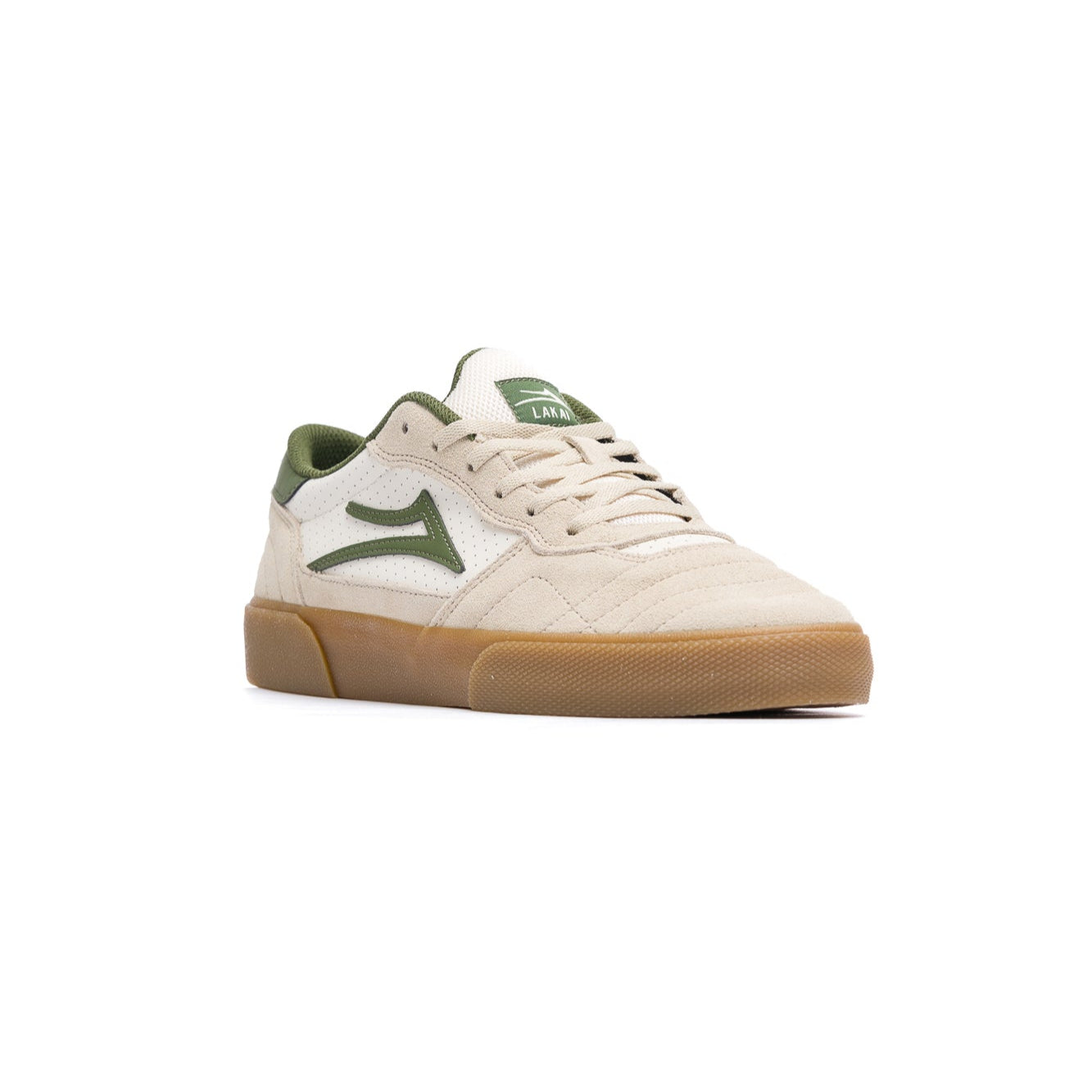 tan lakai cambridge skateboarding sneaker with green accents on a white background