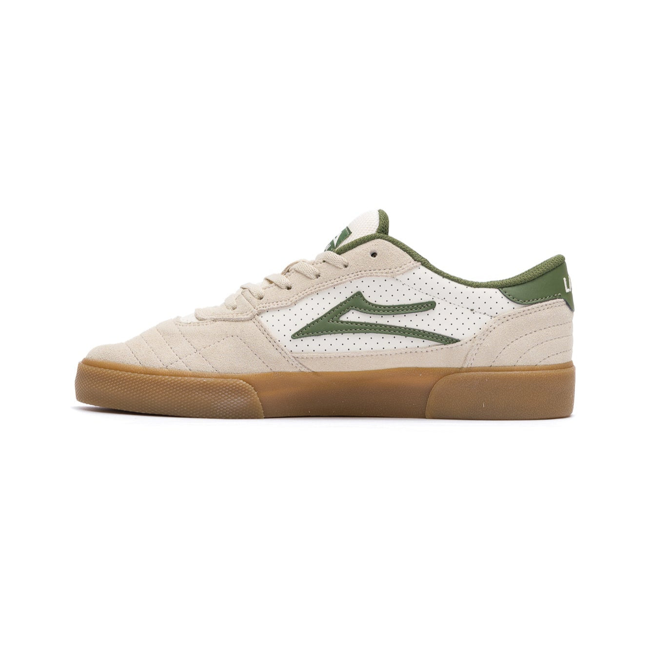 tan lakai cambridge skateboarding sneaker with green accents on a white background