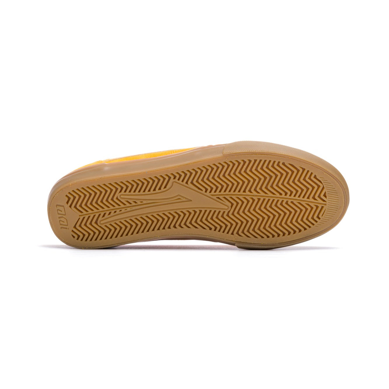 Yellow lakai griffin sneaker with a brown sole on a white background