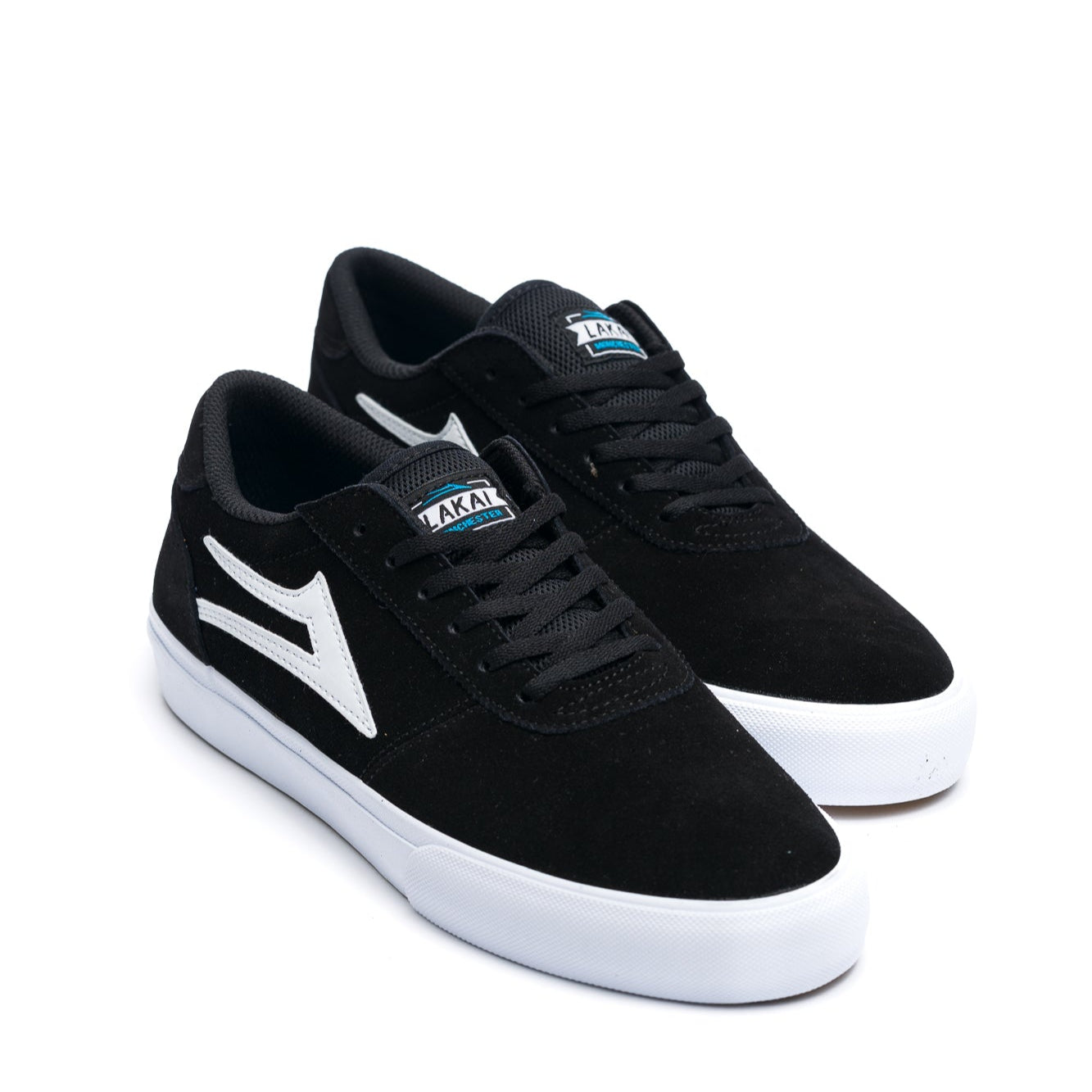 Black lakai manchester skateboarding sneaker with a white logo on a white background