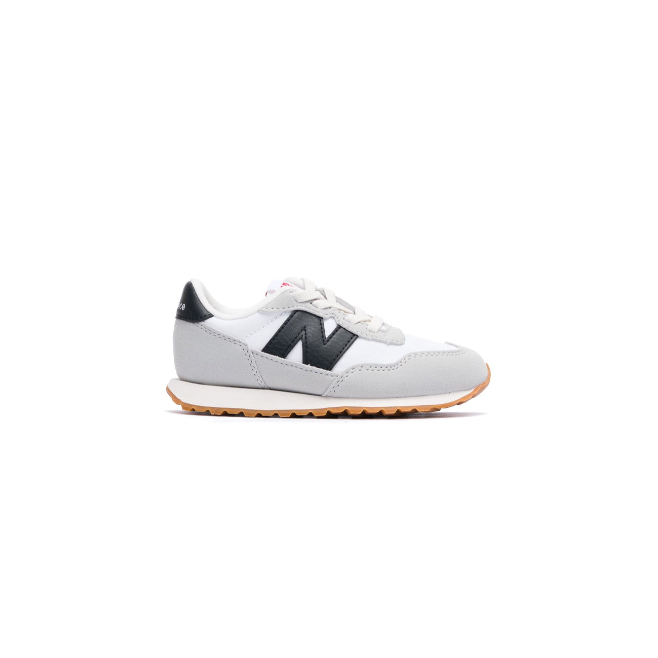 White new balance 237 toddler sneaker with black accents on a white background