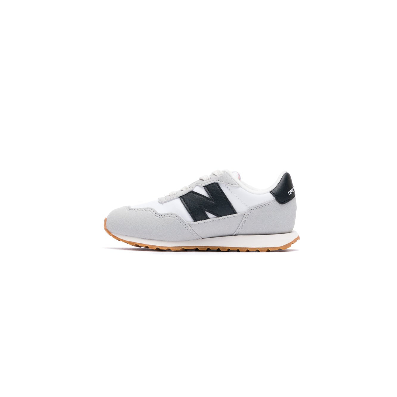 White new balance 237 toddler sneaker with black accents on a white background