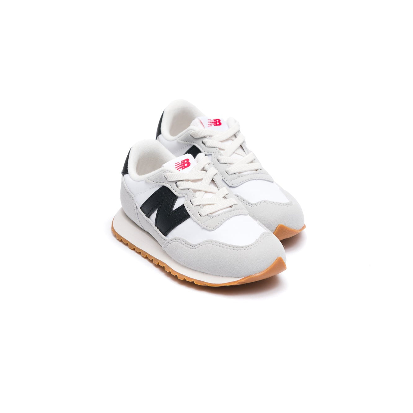 White new balance 237 toddler sneaker with black accents on a white background