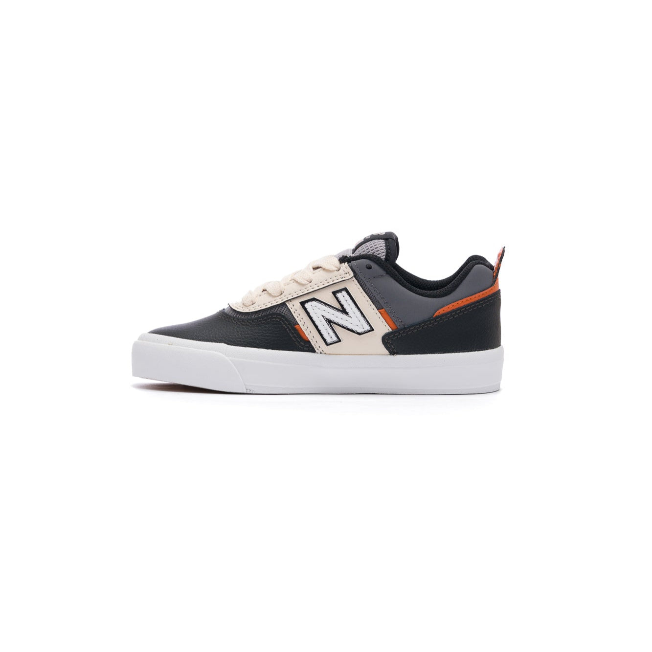 Black and white new balance numeric kids skateboarding sneaker with orange accents on a white background
