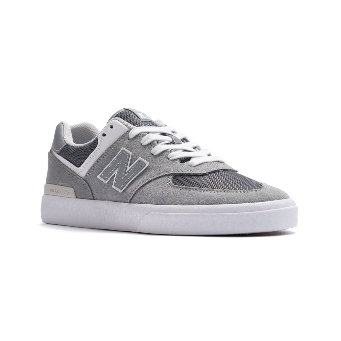 grey new balance numeric men's 574 skateboard shoe with white sole available in wide size 2e