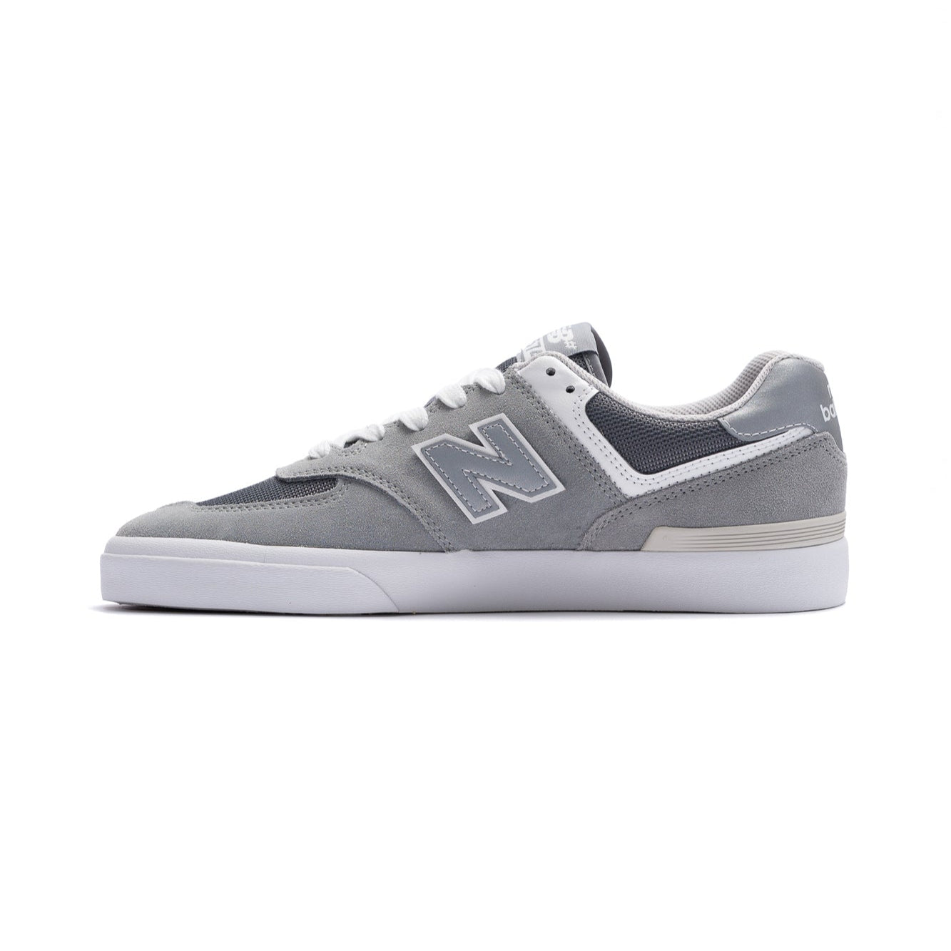 grey new balance numeric men's 574 skateboard shoe with white sole available in wide size 2e