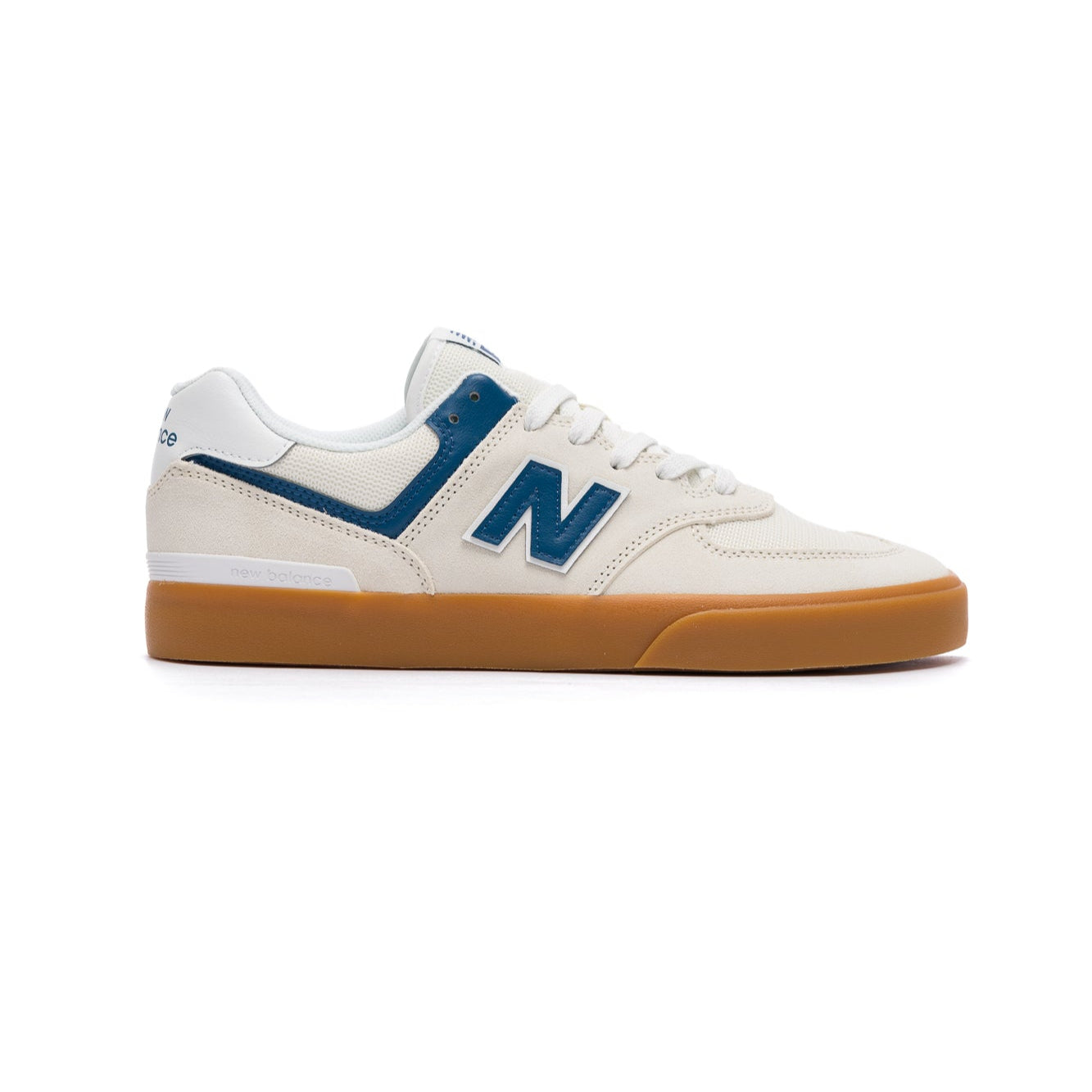 White new balance numeric 574 skateboard sneaker with blue accents on a white background and gum sole