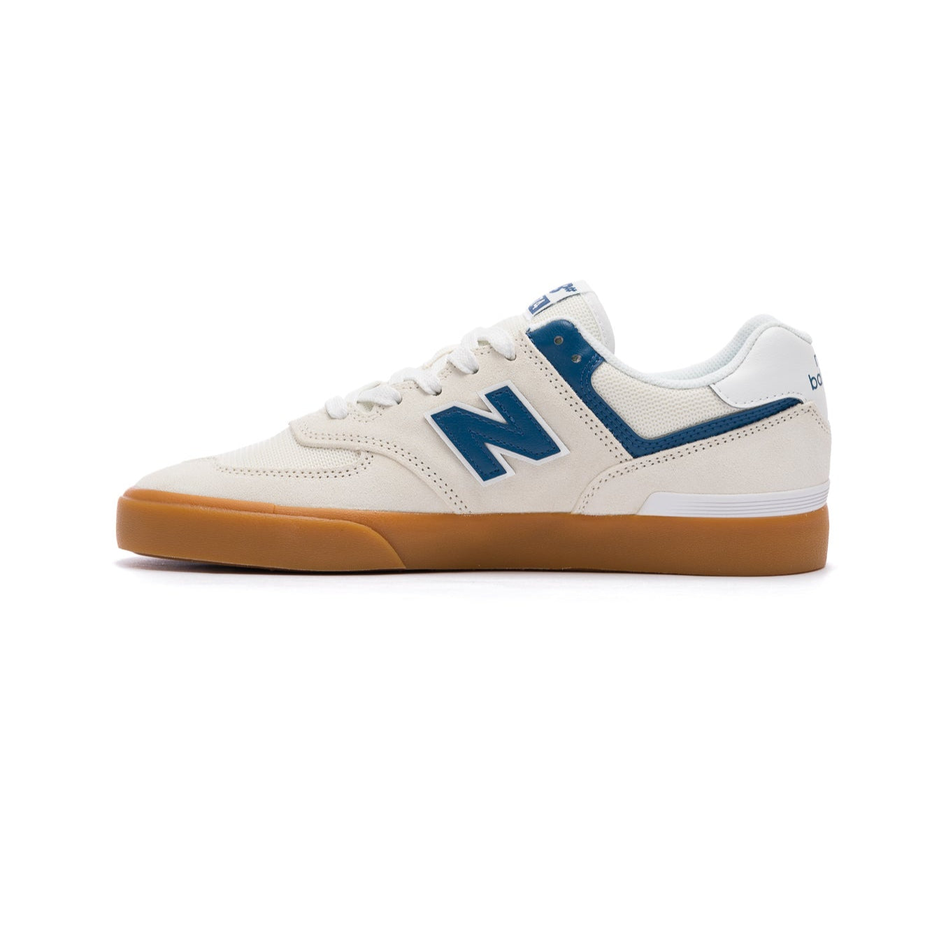 White new balance numeric 574 skateboard sneaker with blue accents on a white background and gum sole