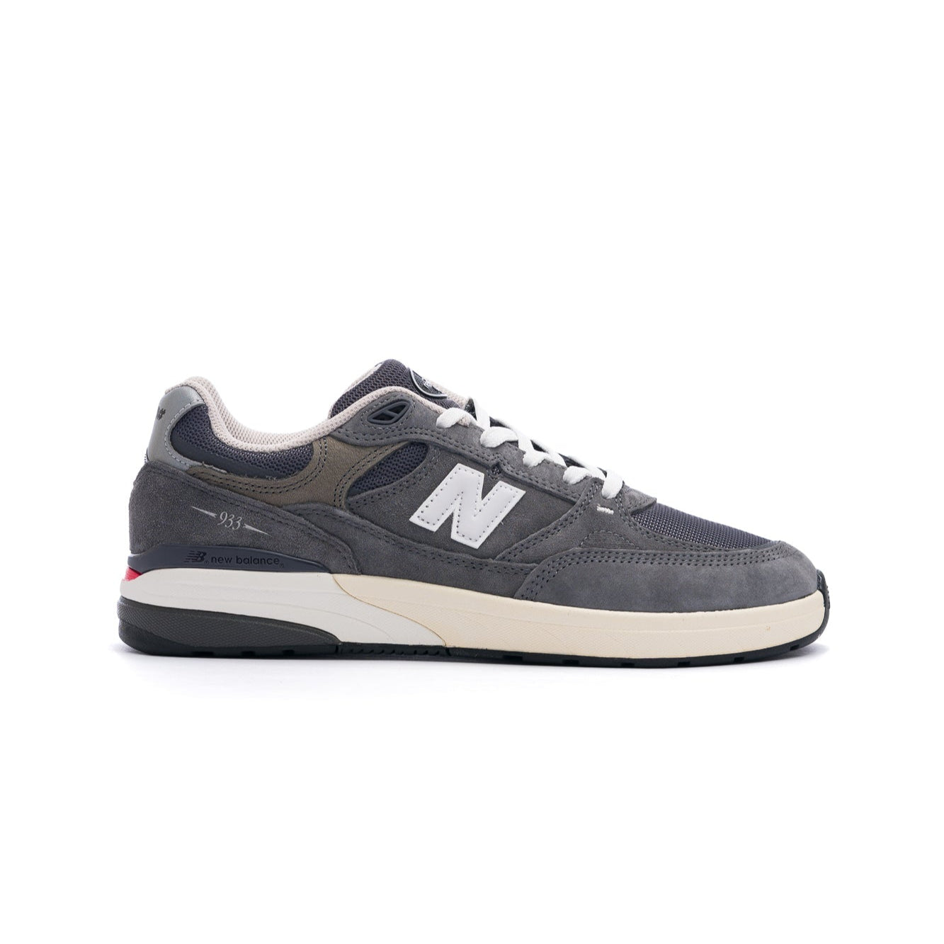 grey new balance numeric 933 andrew reynolds men's skateboard shoe with white and off white sole with silver N