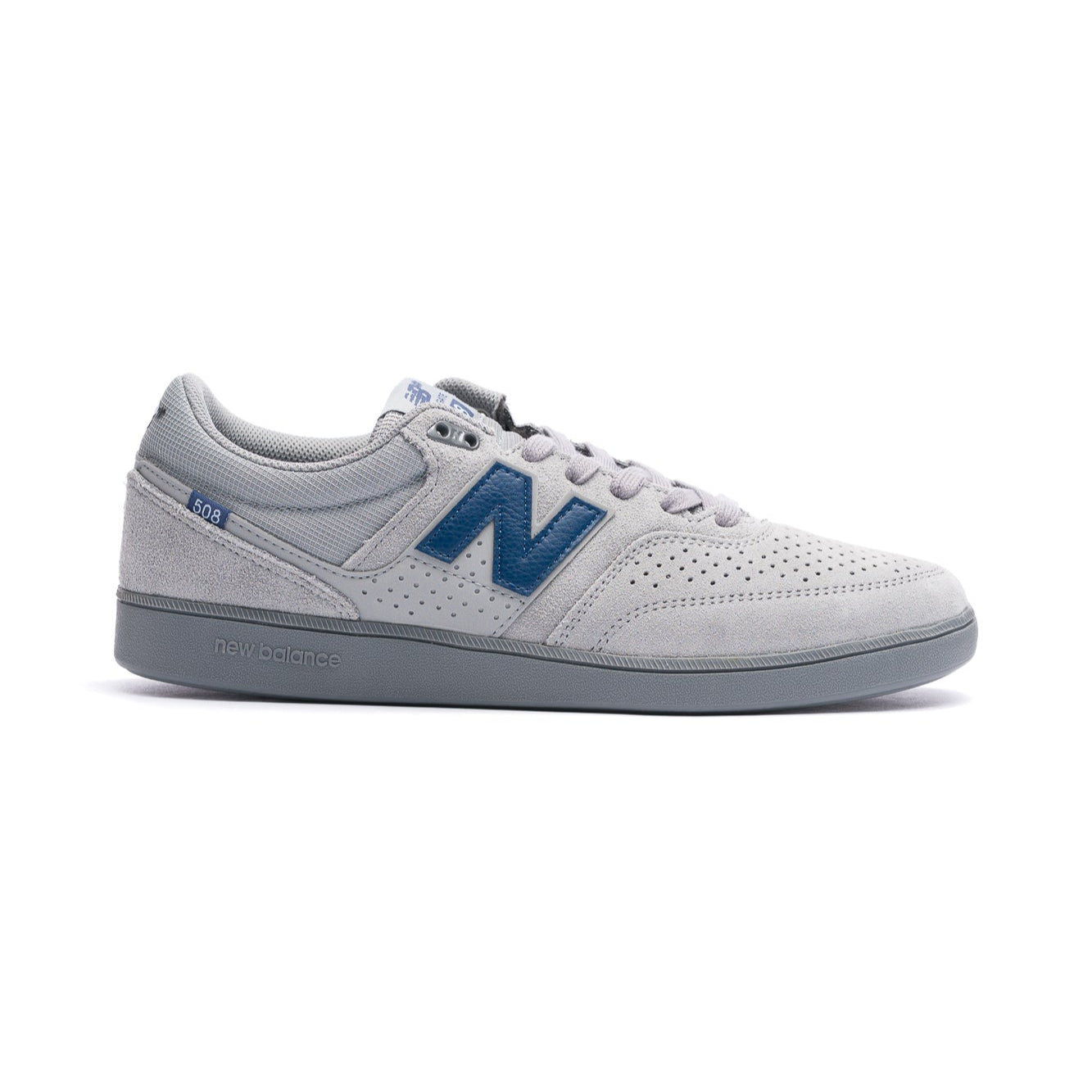 Gray new balance numeric 508 skatebard sneaker with blue accents on a white background