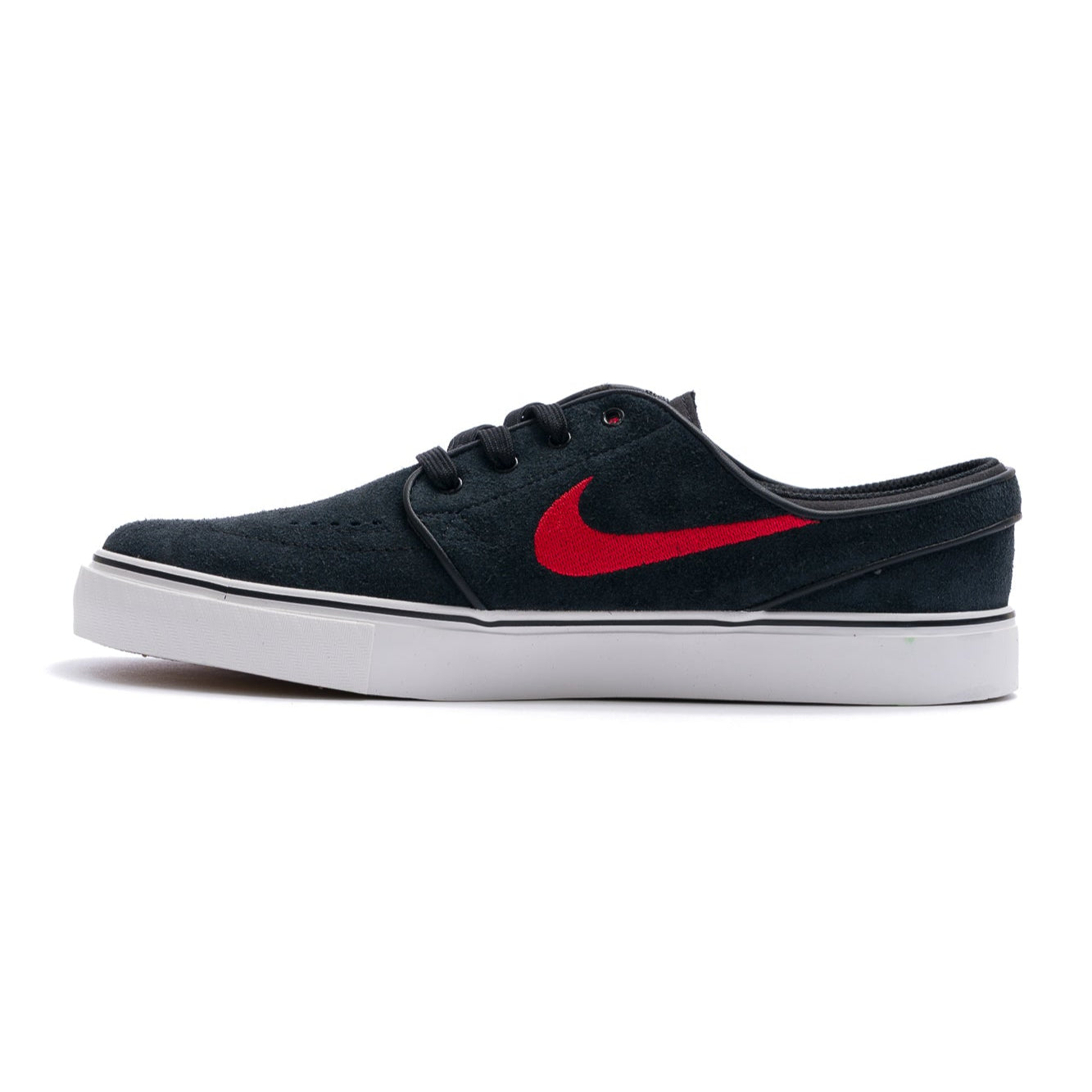 black nike sb janoski kids skate shoe with red swoosh and white sole