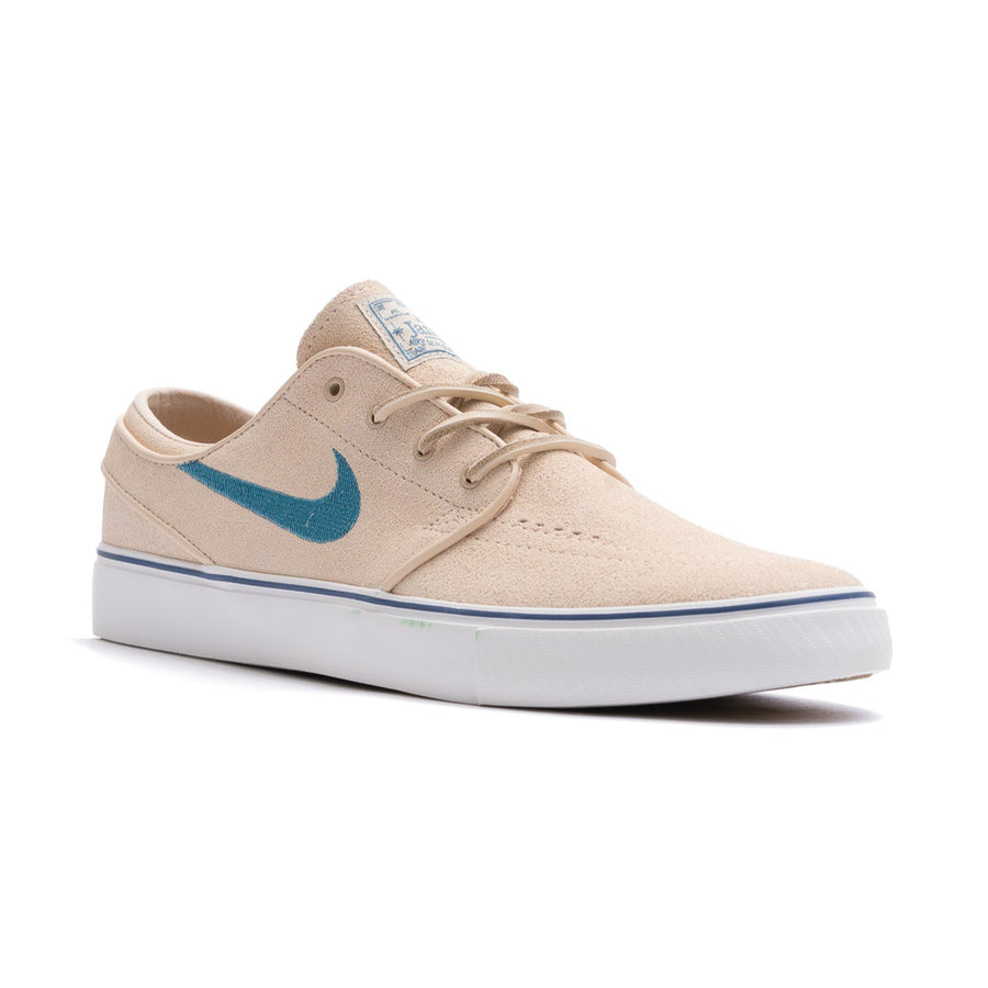 tan nike sb stefan janoski men's skate show with teal blue swoosh and white sole