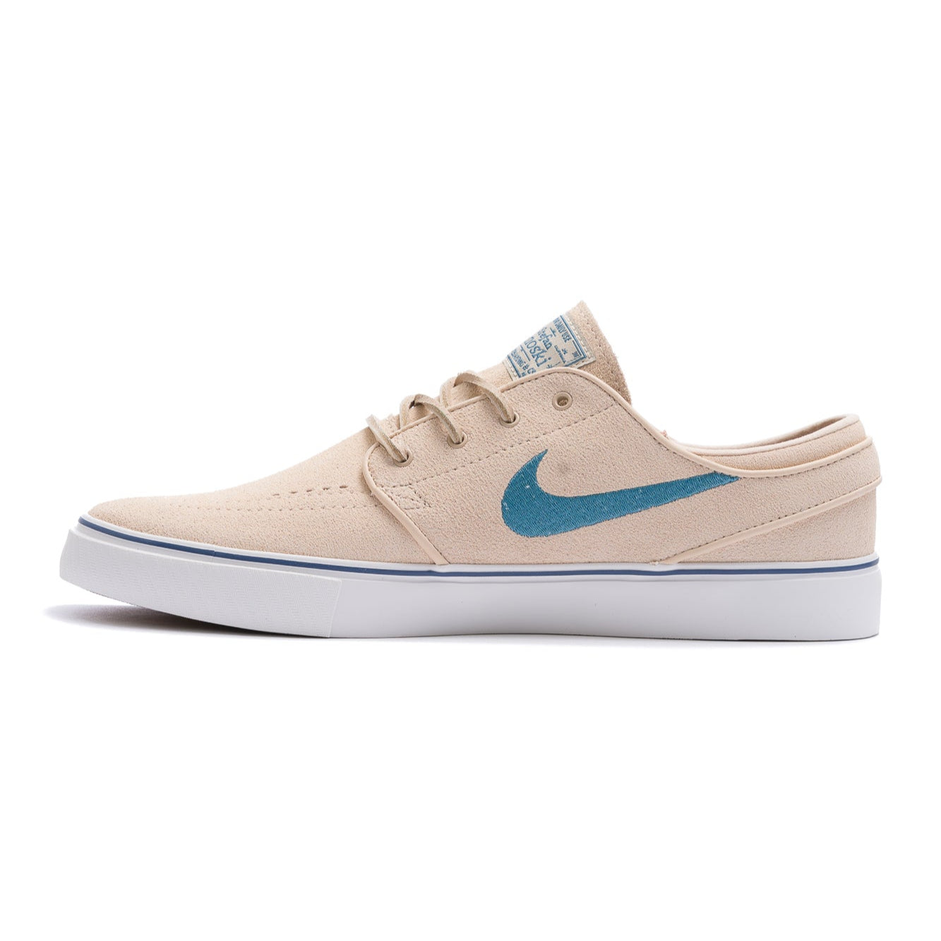 tan nike sb stefan janoski men's skate show with teal blue swoosh and white sole