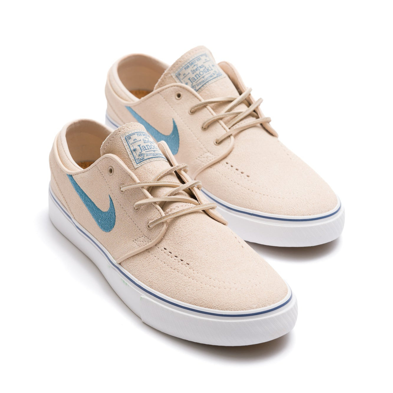 tan nike sb stefan janoski men's skate show with teal blue swoosh and white sole