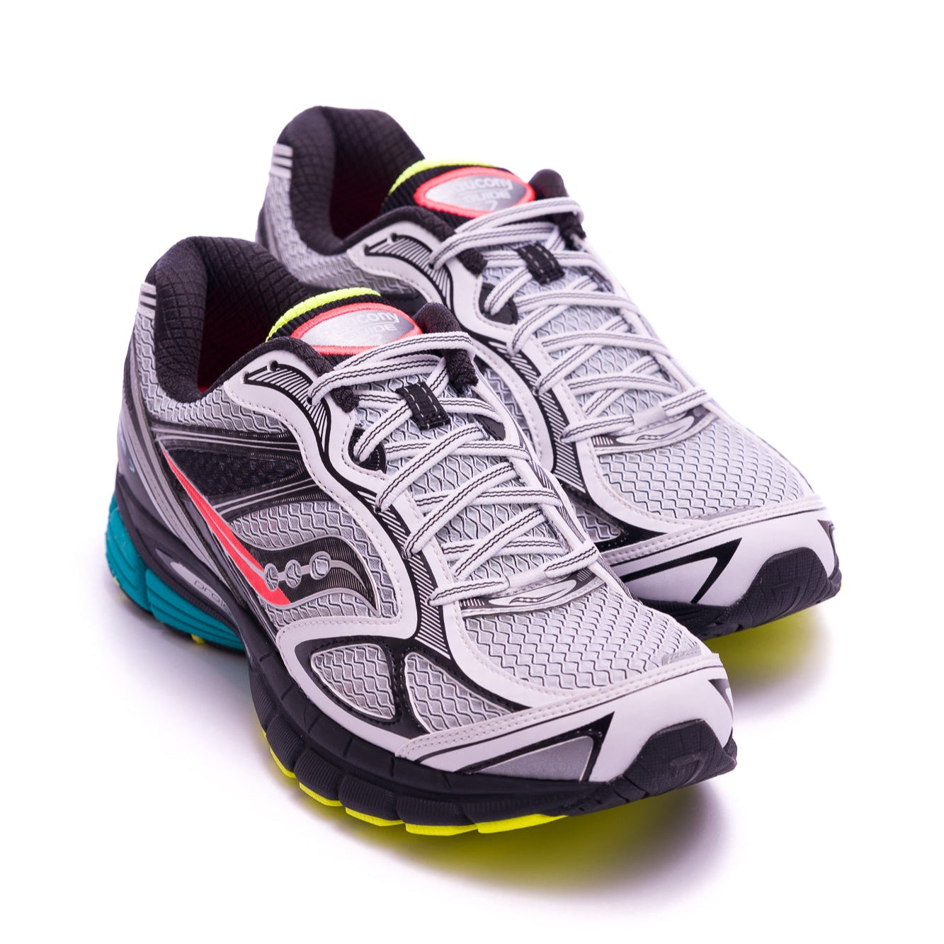 white saucony men's progrid guide with red, blue and yellow details on a black sole