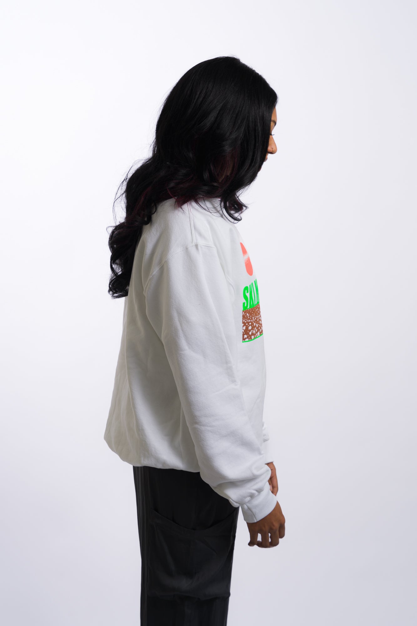 white crew neck sweatshirt with lime green ski mississippi on the front