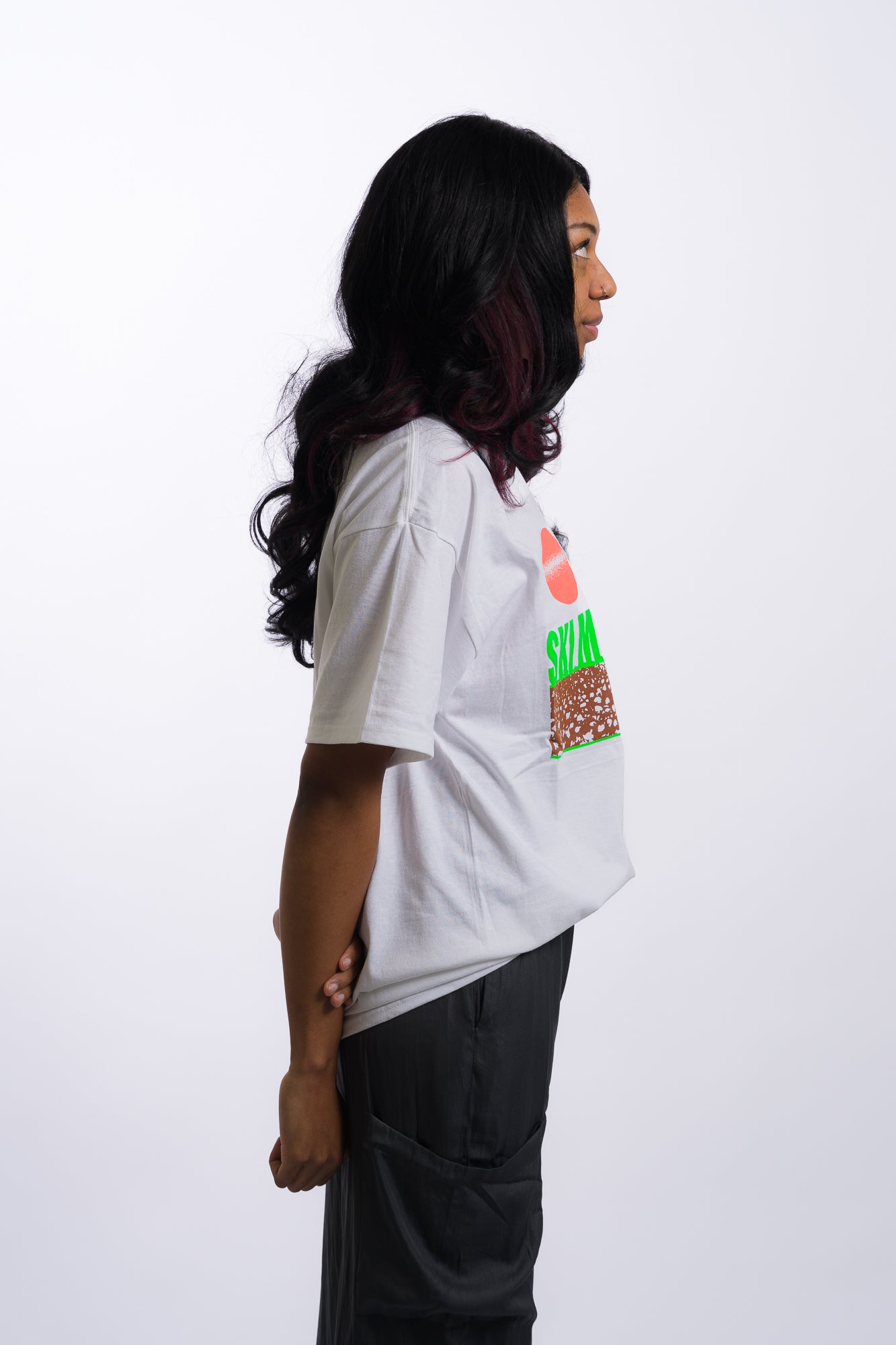 white short sleeve tee shirt with lime green ski mississippi on the front